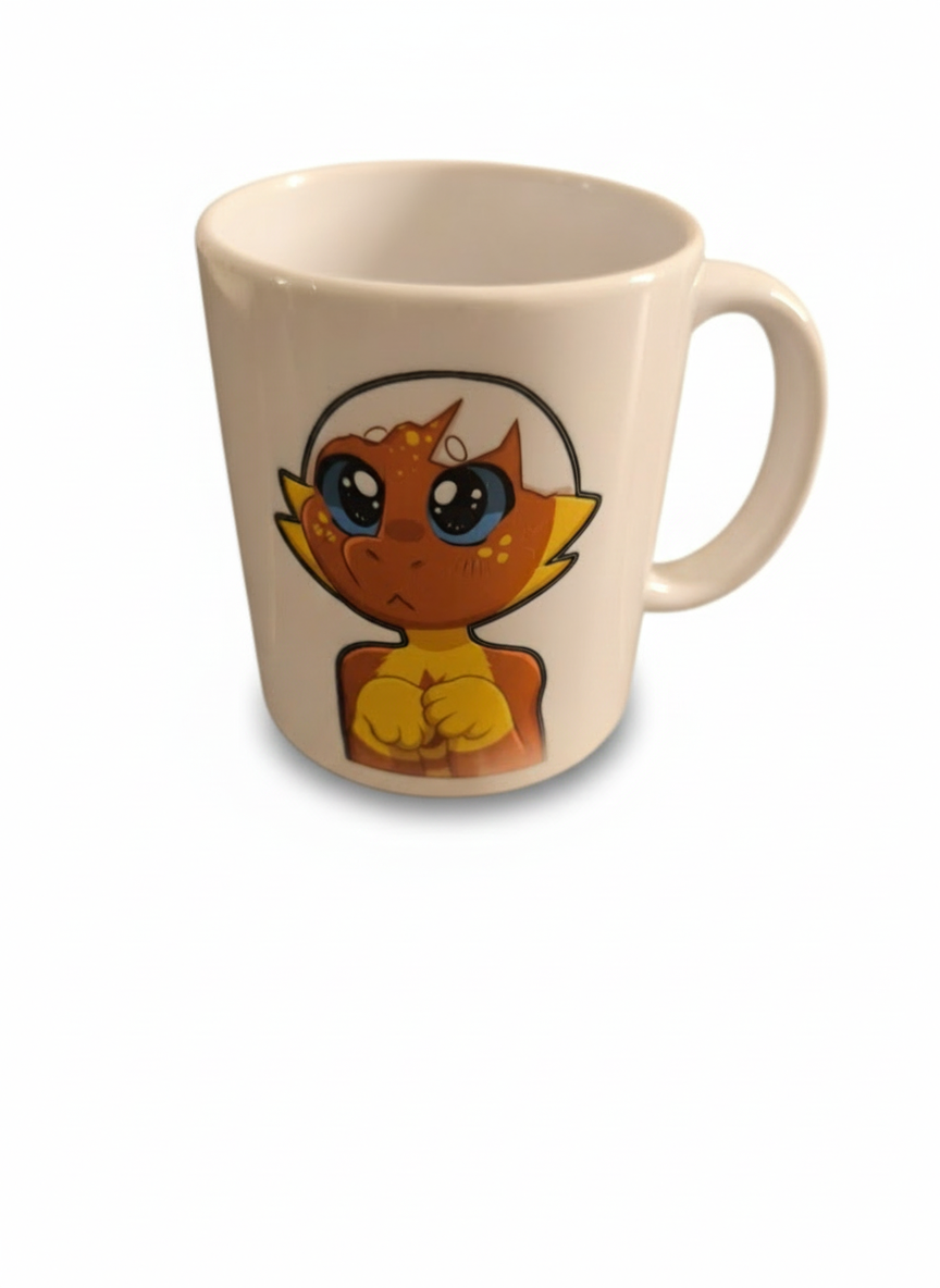 Voici mon bébé dragon qui essaie de faire les yeux tout dout mignon pour vous attendrir